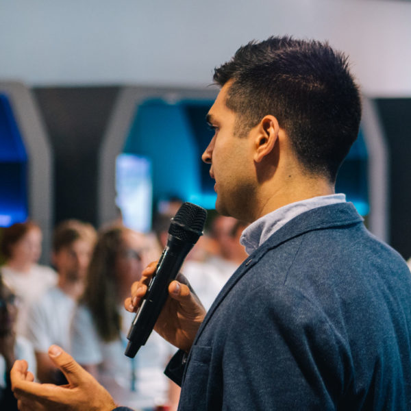 A workshop facilitator speaking at a strategy workshop